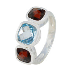 Ida multicolor trilogy gemstone ring with blue and red faceted stones set in silver band