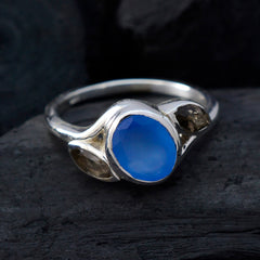 Ellie multicolor trilogy gemstone ring featuring a prominent blue center stone with two smaller side stones in silver setting