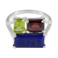 Dewi multicolor trilogy gemstone ring with green, red, and blue rectangular stones in silver setting