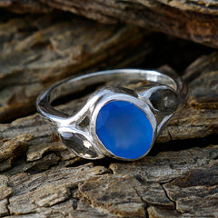 Ellie multicolor trilogy gemstone ring with blue center stone and smoky side gems in silver setting