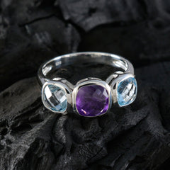 Hazel multicolor trilogy gemstone ring with purple and two light blue gemstones set in silver band