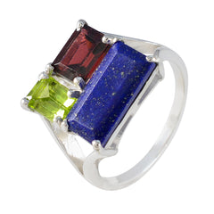 Dewi multicolor trilogy gemstone ring with rectangular blue, red, and green stones set in silver band
