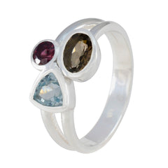 Mila multicolor trilogy gemstone ring with three distinct colored gemstones set in silver band