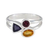Lourdes multicolor trilogy gemstone ring with three different colored stones set in silver band