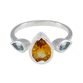 Kennedy multicolor trilogy gemstone ring with pear-shaped orange and blue stones in silver band