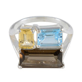 Rebeca multicolor trilogy gemstone ring with yellow, blue, and brown rectangular stones on silver band