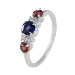 Maria multicolor trilogy ring with central blue stone red side stones and diamond accents in silver band