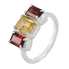 Aurora multicolor trilogy ring with three square gemstones in red, yellow, and brown set on silver band