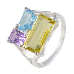 Rosa multicolor trilogy ring featuring blue, yellow, and purple gemstones set in silver band