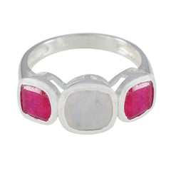 Putri multicolor trilogy ring with silver band and two pink stones flanking one white stone