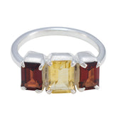 Aurora multicolor trilogy ring with three rectangular gemstones in red and yellow set in silver band