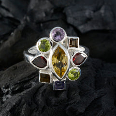 Noelia navratna cocktail ring with marquise yellow center and multicolor gemstones in silver setting