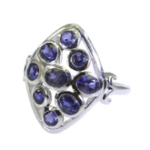 Kennedy navratna gemstone ring with multiple deep blue oval and round stones set in silver band