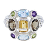 Liyana Navratna gemstone ring with multicolored gemstones set in silver band