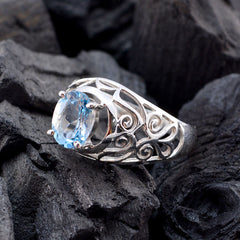 Nova Filigree Blue Solitaire Ring Elegant Design