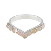 Hua pink gemstone ring for women with small round pink stones set in a silver V-shaped band