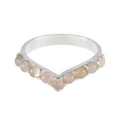 Hua pink gemstone ring for women with small round pink stones set in a silver V-shaped band