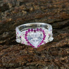 Yasmin pink halo gemstone ring with heart-shaped center stone and pink surrounding stones on silver band