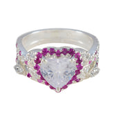 Yasmin pink halo gemstone ring with heart-shaped center stone and surrounding pink and clear gemstones