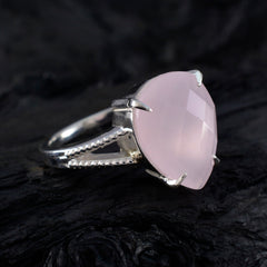 Tereza pink solitaire engagement ring with a large faceted pink stone set in silver band