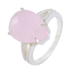 Tereza pink solitaire engagement ring with pear-shaped pink gemstone and silver band