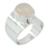 Scarlett pink solitaire ring for women with wide silver band and smooth oval pink stone