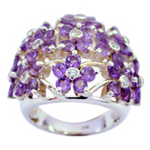 Isadora purple floral gemstone ring with clustered amethyst flower motifs and sterling silver band