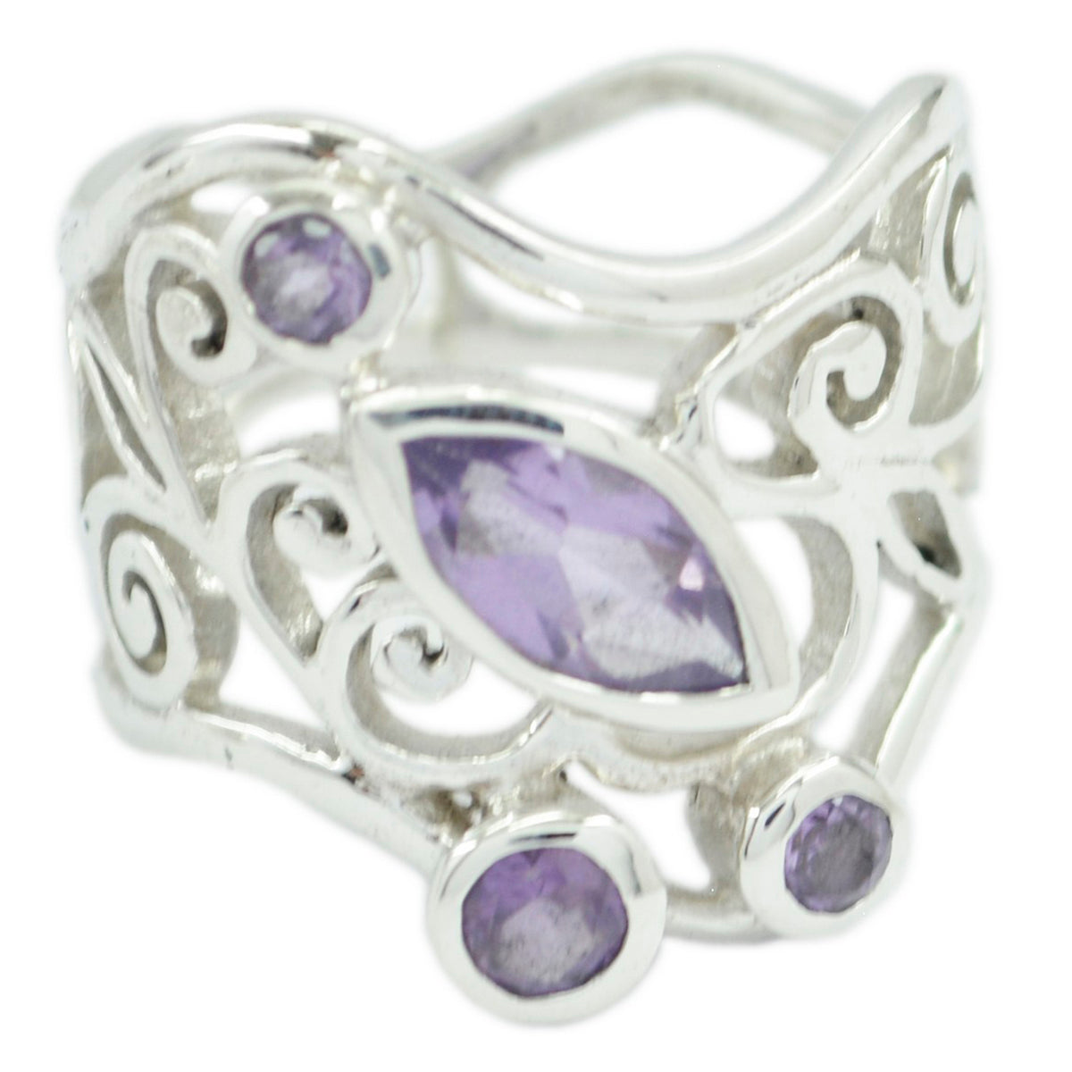Nisa purple gemstone filigree ring with intricate silver swirls and multiple purple stones