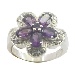 Saanvi purple gemstone flower ring with five purple stones in a floral silver setting