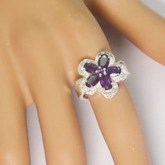 Saanvi purple gemstone flower ring with silver band worn on finger