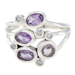 Freya purple gemstone ring for women with multiple oval purple stones and small clear accents