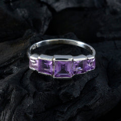 Priya purple gemstone ring with five square-cut purple stones set in silver band