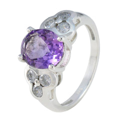 Harper silver ring featuring a large purple gemstone ring centerpiece with clear accent stones