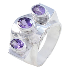 Olivia silver ring featuring three purple gemstones in a modern setting purple gemstone ring