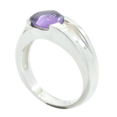 Kristine purple gemstone solitaire ring with polished silver band and smooth amethyst stone