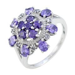 Micaela purple gemstone statement ring with multiple oval and round purple stones set in silver band