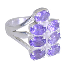 Audrey purple gemstone statement ring with multiple oval purple gemstones set in silver band