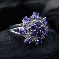 Micaela purple gemstone statement ring with multiple oval purple stones set in silver band