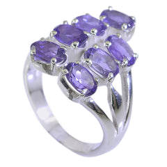 Audrey purple gemstone statement ring with multiple oval purple stones set in silver band