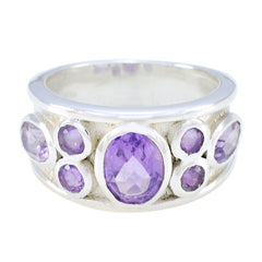 Nayara purple gemstone statement ring with multiple oval purple stones set in silver band