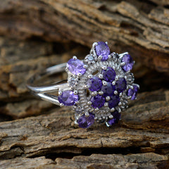 Micaela purple gemstone statement ring with multiple oval and round purple stones in silver setting