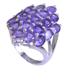 Renata purple gemstone statement ring featuring multiple oval purple gemstones in a silver setting