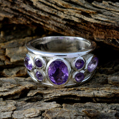Nayara purple gemstone statement ring with multiple purple stones set in silver band