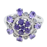 Micaela purple gemstone statement ring featuring multiple oval and round purple stones set in silver