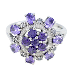 Micaela purple gemstone statement ring featuring multiple oval and round purple stones set in silver
