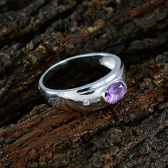 Grace silver ring featuring a purple gemstone toi et moi ring design with a round purple stone on textured bark