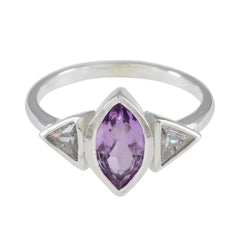 Priya silver purple gemstone trilogy ring with marquise purple center and two clear triangular side stones