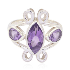 Camila purple gemstone trilogy ring featuring three purple stones with elegant silver swirl design
