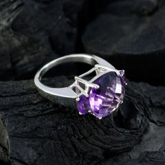 Layla purple gemstone trilogy ring with three faceted purple stones set in silver band