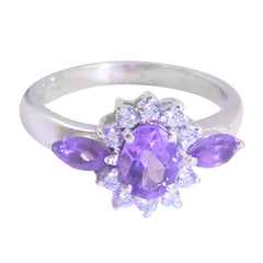 Lily purple gemstone trilogy ring with oval center stone and side marquise purple gems